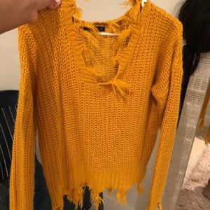 Ripped sweater